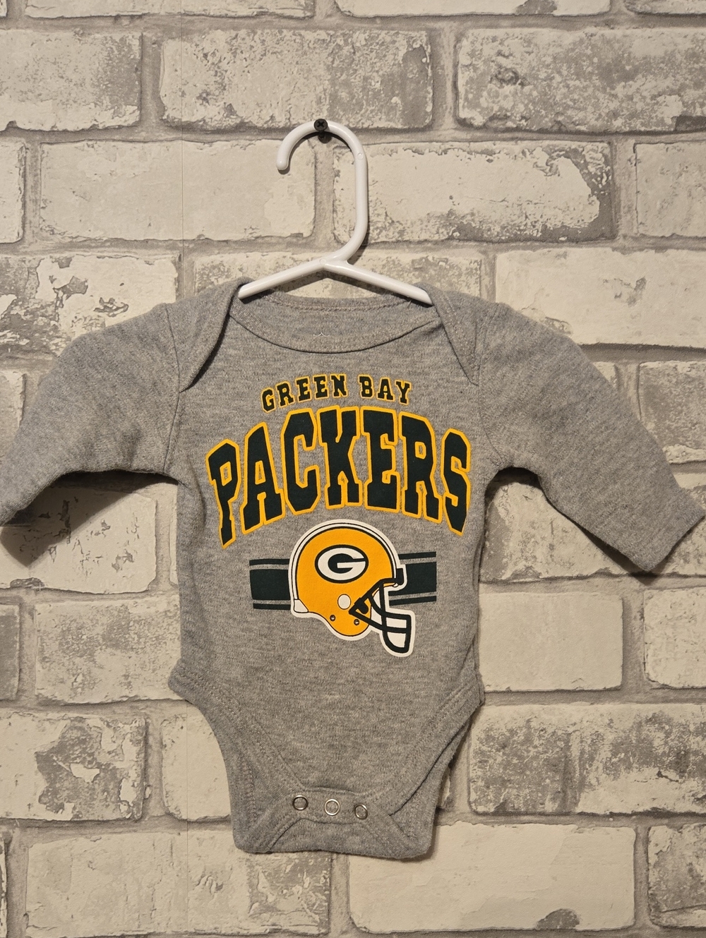 NFL Gray Green Bay Packers Long-Sleeve Bodysuit with Yellow Helmet Graphic